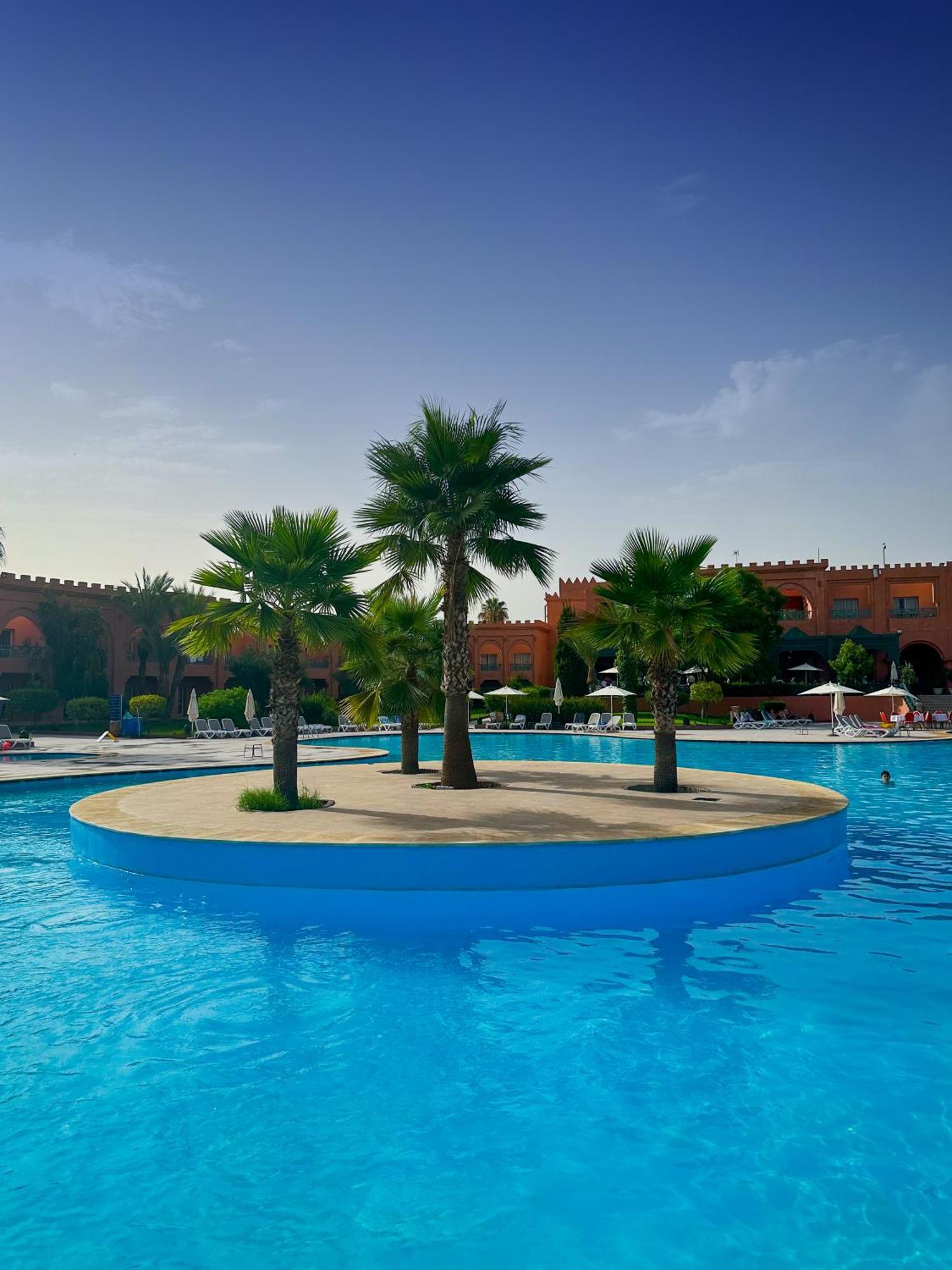 Grand Mogador Agdal & Spa Марракеш Экстерьер фото The swimming pool at the hotel